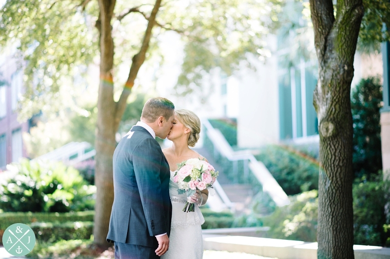 Bride and groom kissing, southern wedding, wedding first look, Anna + Jon Bak's Charleston Wedding Photos by Aaron and Jillian Photography - Charleston Wedding Photographers 